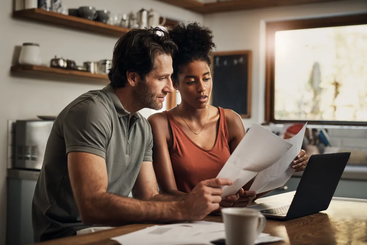 Man and woman discussing personal service financial planning